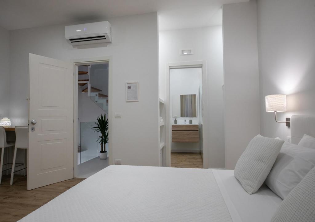Postel nebo postele na pokoji v ubytování Blanco B&B - Group