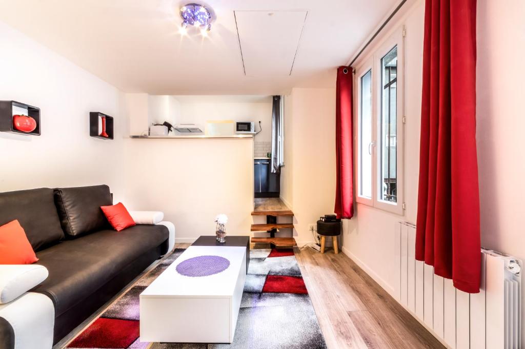 Een zitgedeelte bij Appartement design Coty 4 pers Centre ville Le Havre