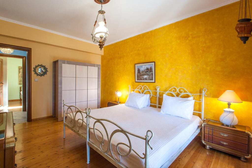 Postel nebo postele na pokoji v ubytování Aegean Sea Villa Skiathos