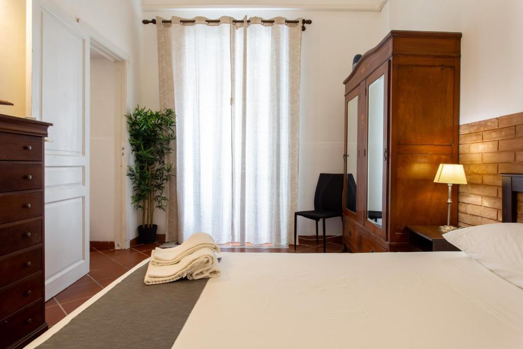 A bed or beds in a room at Le Dimore del Mito - Atalanta