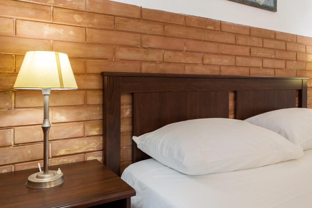 A bed or beds in a room at Le Dimore del Mito - Atalanta