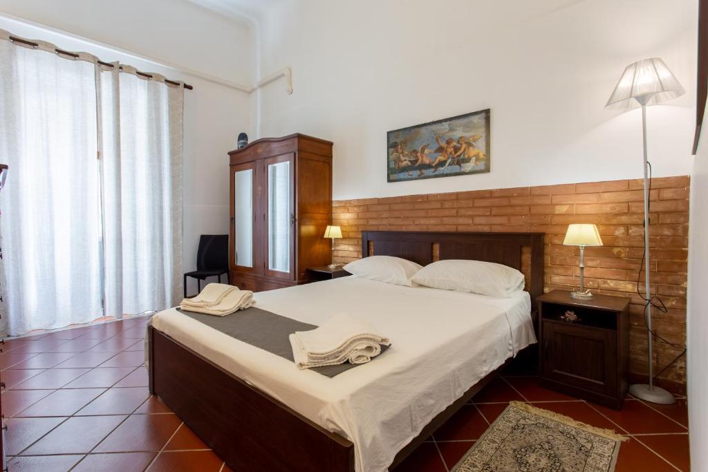 A bed or beds in a room at Le Dimore del Mito - Atalanta
