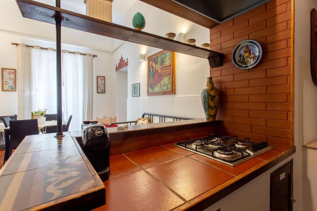 A kitchen or kitchenette at Le Dimore del Mito - Atalanta