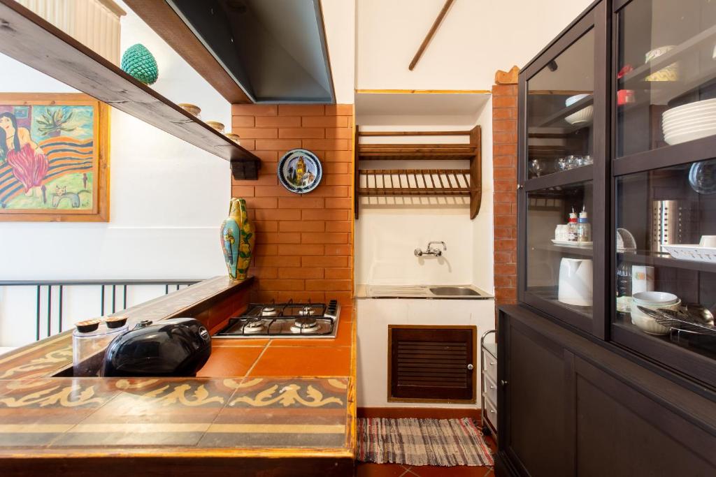 A kitchen or kitchenette at Le Dimore del Mito - Atalanta