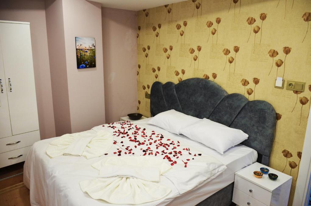 Postel nebo postele na pokoji v ubytování Rodion Hotel