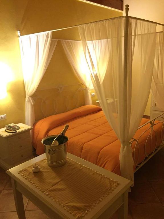 Postel nebo postele na pokoji v ubytování Agriturismo ciociaro " il colle " HOTEL RISTORANTE