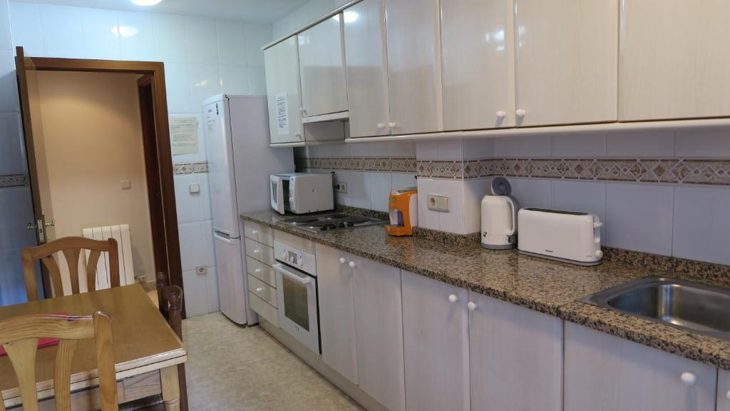 Kuchyň nebo kuchyňský kout v ubytování Casa Nova Regi