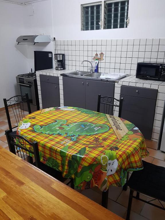 Kuchyň nebo kuchyňský kout v ubytování Appartement de la Baie