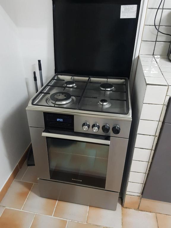 Kuchyň nebo kuchyňský kout v ubytování Appartement de la Baie
