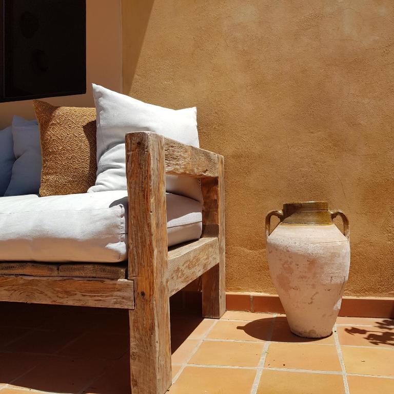 A bed or beds in a room at Casa Naya Rural