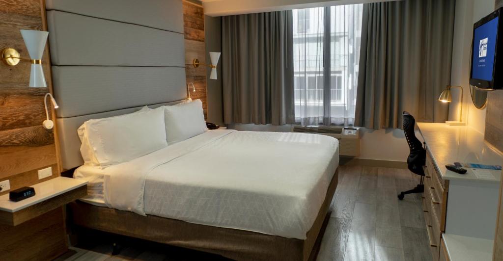 Postel nebo postele na pokoji v ubytování Holiday Inn Express San Juan Condado by IHG
