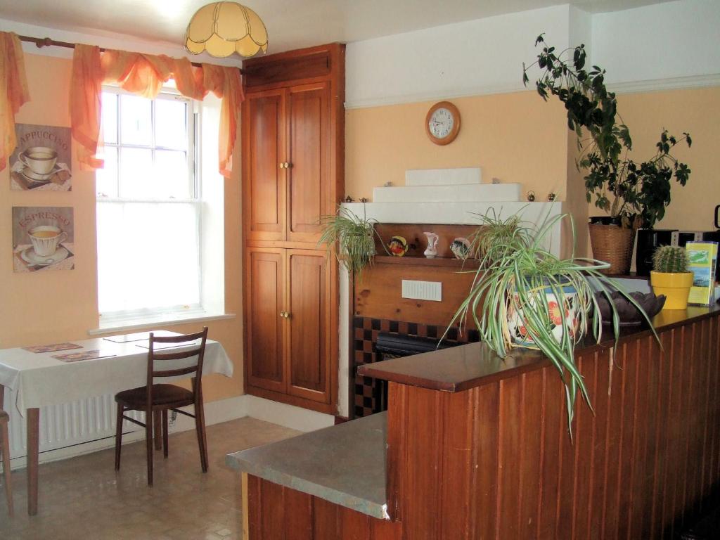 Kuchyň nebo kuchyňský kout v ubytování Ivy House Holiday Home