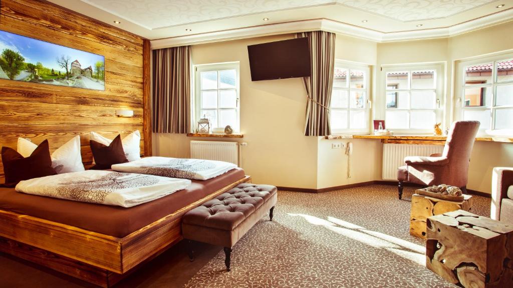 Televiisor ja/või meelelahutuskeskus majutusasutuses Hotel Kepplers Ecke