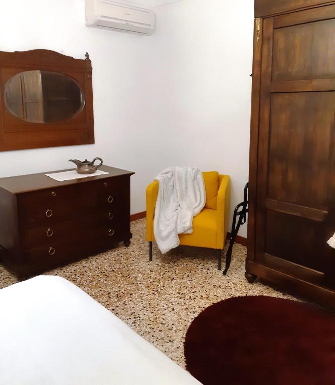 Postel nebo postele na pokoji v ubytování Palazzo Strassoldo bed & breakfast
