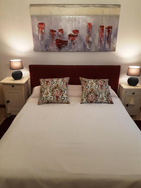 Postel nebo postele na pokoji v ubytování Palazzo Strassoldo bed & breakfast