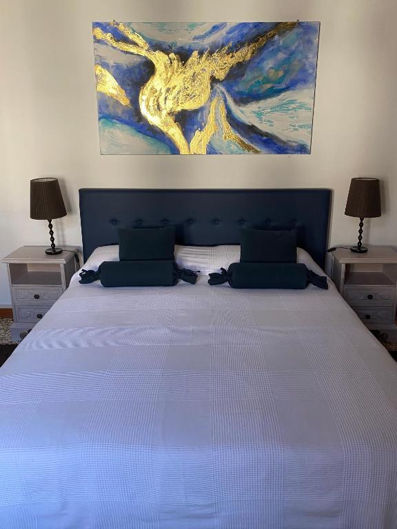 Postel nebo postele na pokoji v ubytování Palazzo Strassoldo bed & breakfast