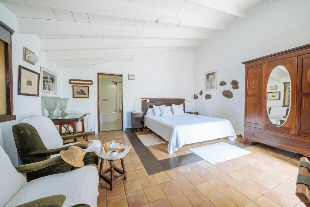 Postel nebo postele na pokoji v ubytování Hotel Rural Las Calas