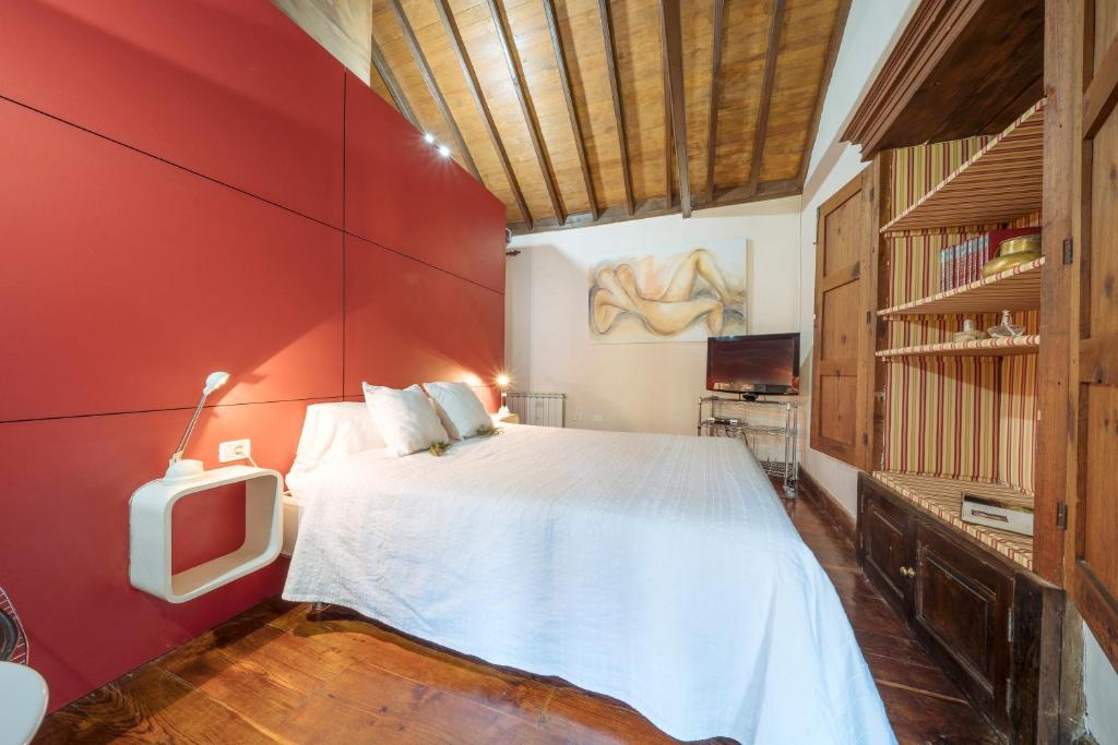 Postel nebo postele na pokoji v ubytování Hotel Rural Las Calas