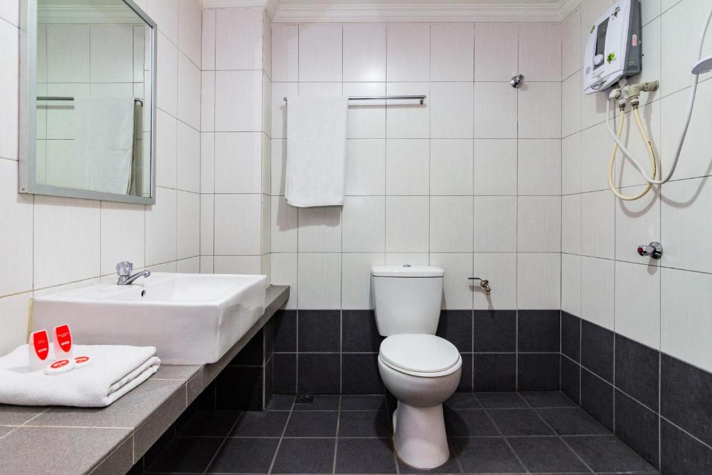 Koupelna v ubytování Super OYO 1159 Hotel New Sabah