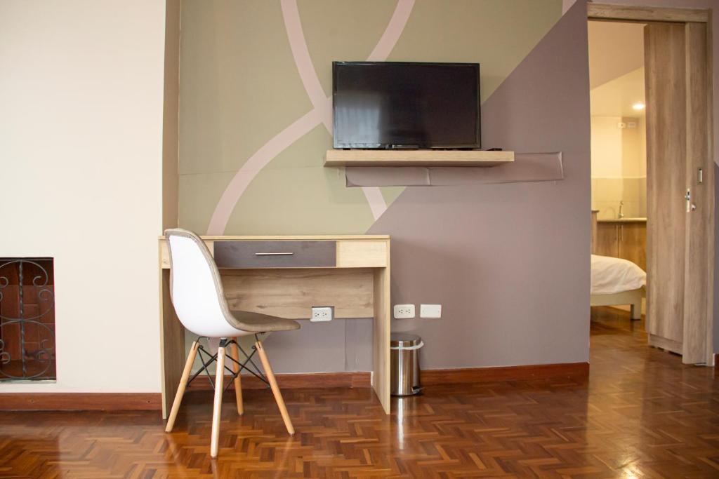 TV a/nebo společenská místnost v ubytování Hotel Sandmelis
