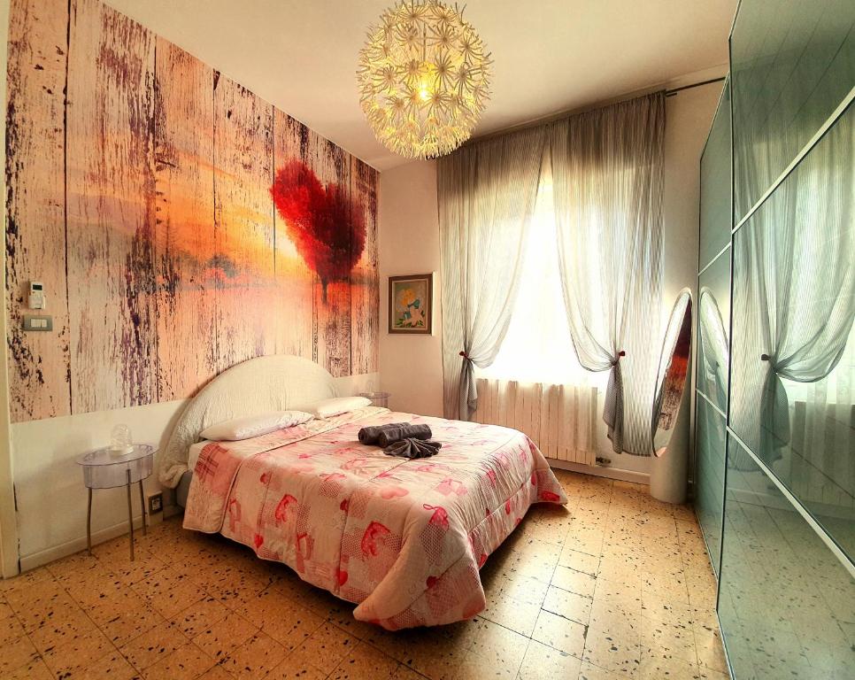 Posteľ alebo postele v izbe v ubytovaní Accogliente Casa Indipendente con Wi-Fi Gratuito, a Due Passi dal Centro e dalle Attrazioni