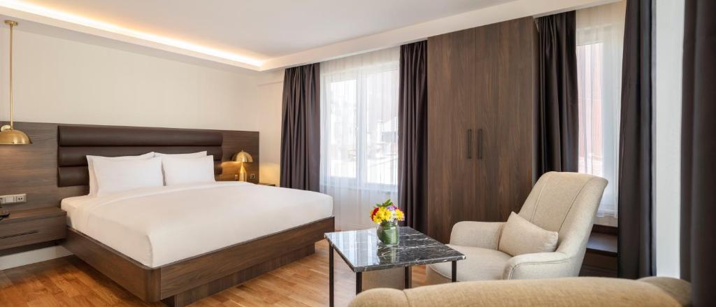 Postel nebo postele na pokoji v ubytování The Rooms Nisantasi