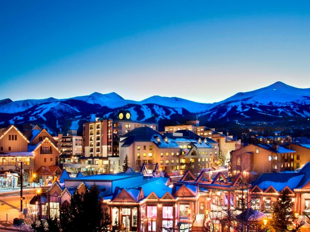 a large building with a sky background at Village at Breckenridge Resort in Breckenridge