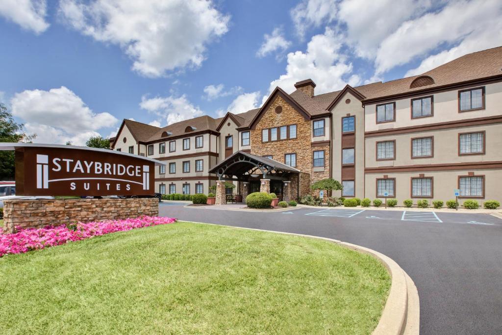 a rendering of the staybridge hotel syracuse courtyard at Staybridge Suites Louisville - East, an IHG Hotel in Louisville