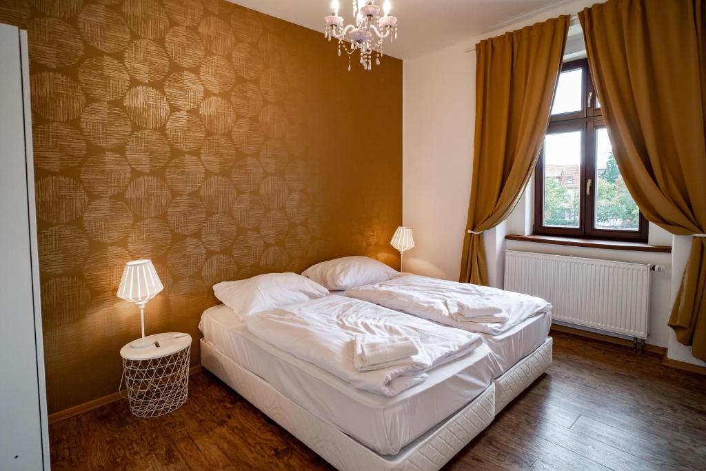 Lova arba lovos apgyvendinimo įstaigoje Apartmany Pisek