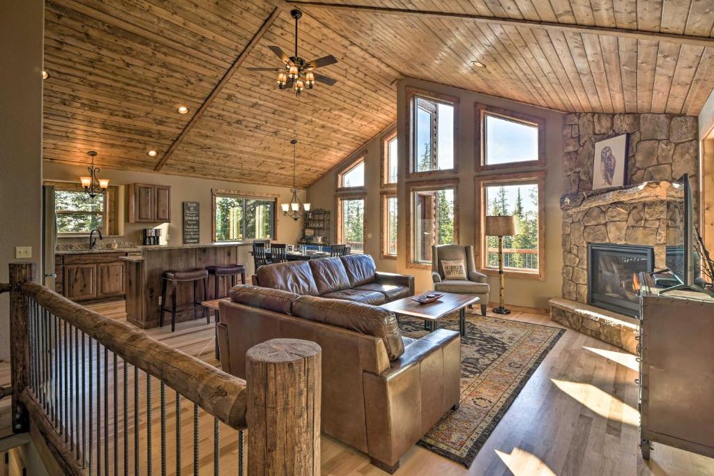 a living room with a couch and a fireplace at Fairplay Dream Escape 27 Miles to Breckenridge! in Fairplay