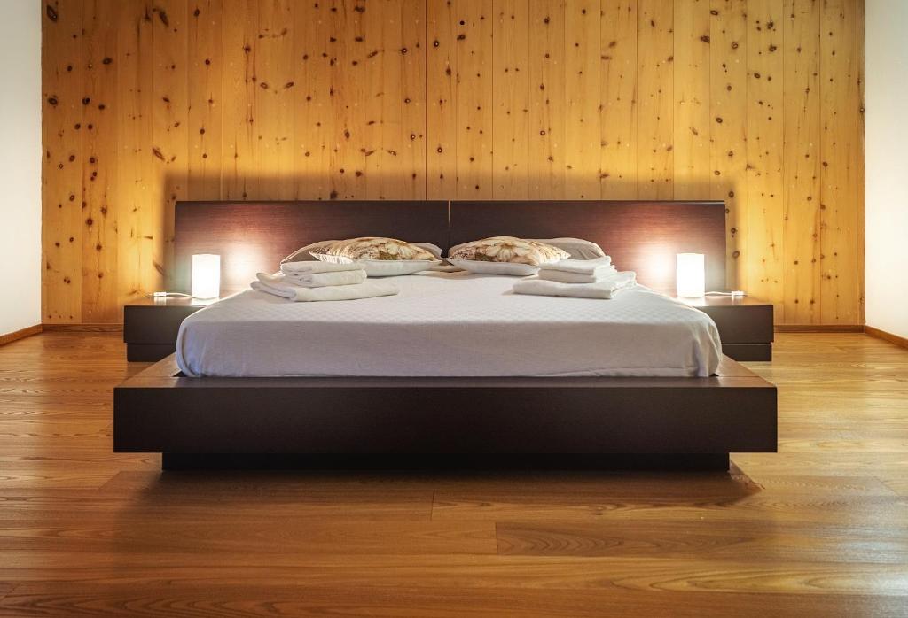 A bed or beds in a room at Wooden house