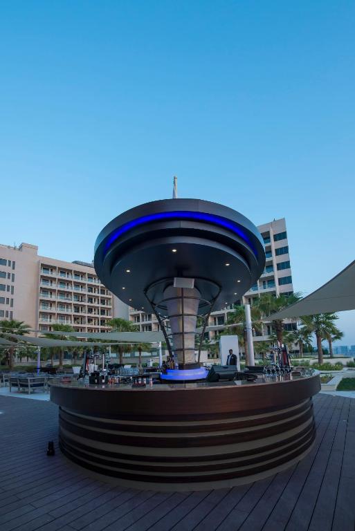 a building with a blue dome on top of it at Crowne Plaza Yas Island by IHG in Abu Dhabi