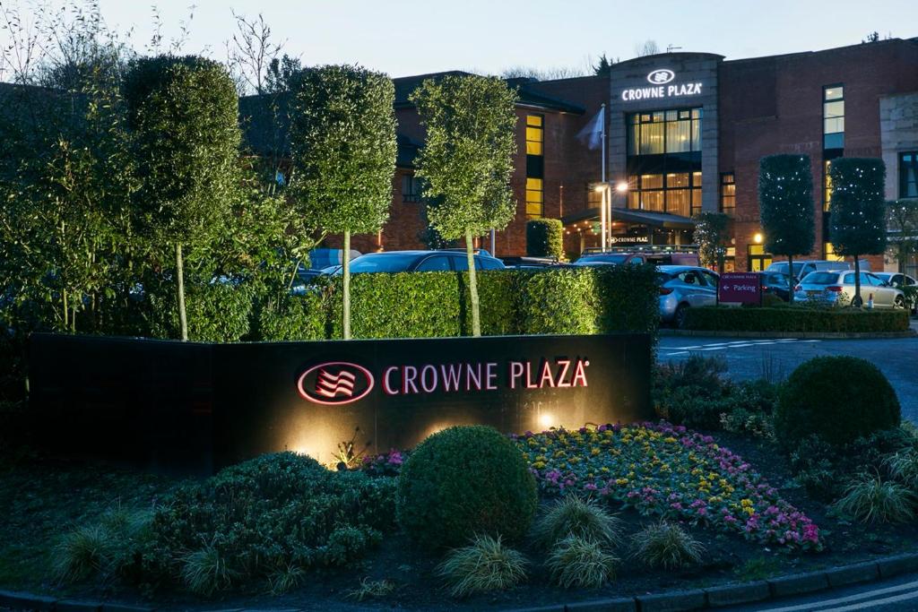a sign for the grove plaza in front of a building at Crowne Plaza - Belfast by IHG in Belfast