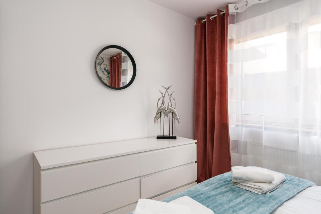 Posteľ alebo postele v izbe v ubytovaní Sleepway Apartments - Strzelecka 29A-15