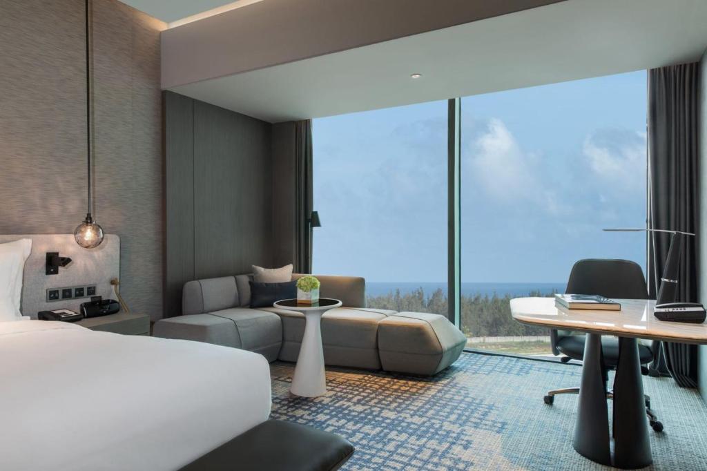 Postel nebo postele na pokoji v ubytování Crowne Plaza Shenzhen World Exhibition and Convention Center by IHG