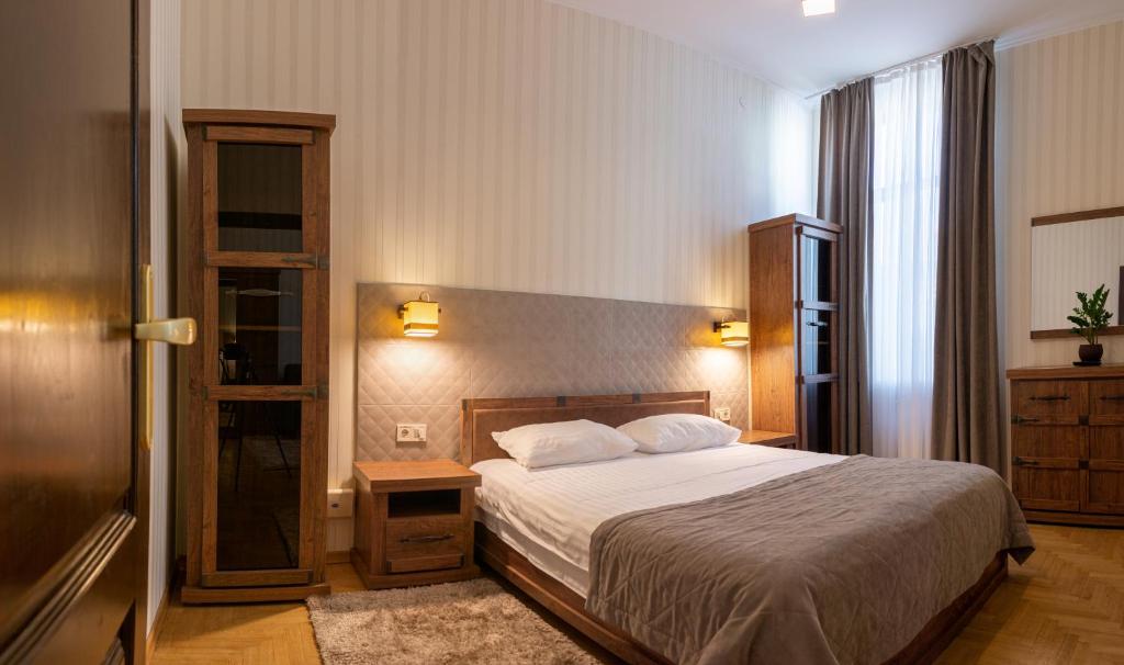 Postel nebo postele na pokoji v ubytování Hotel Star