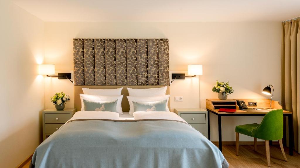 Postel nebo postele na pokoji v ubytování Parkhotel Rothof