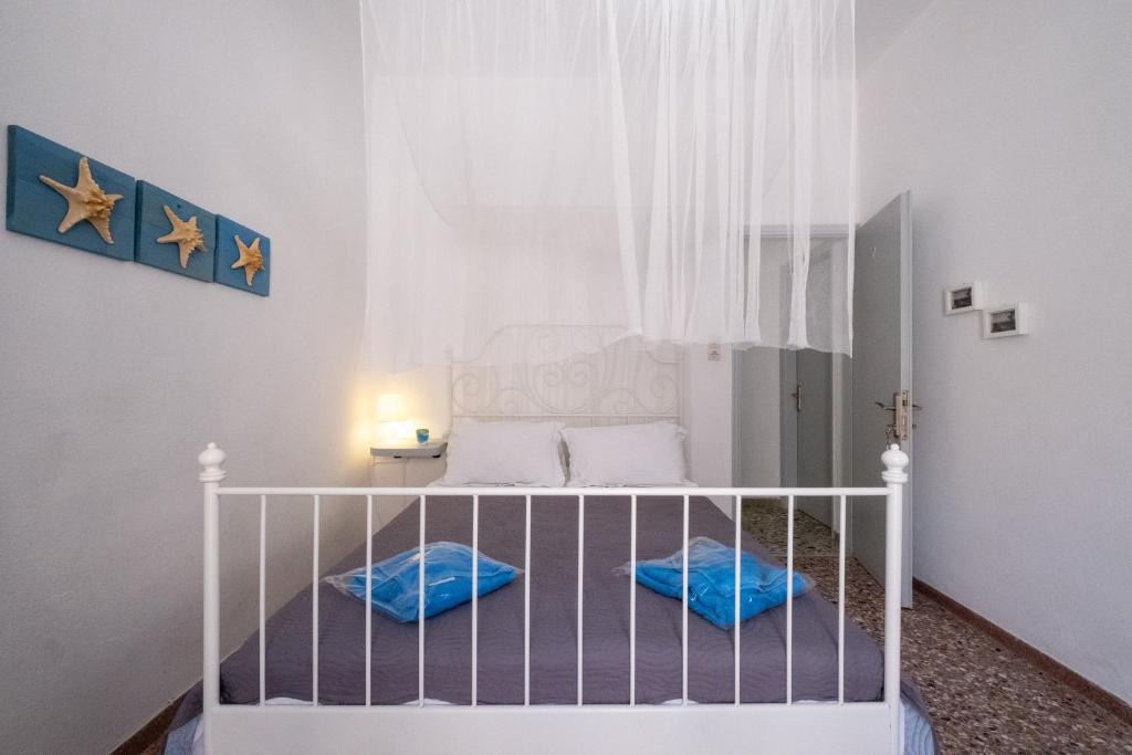 Postel nebo postele na pokoji v ubytování Sagma Beach Rooms