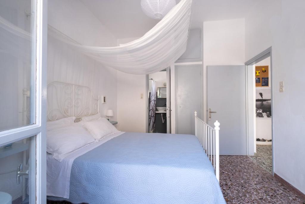 Postel nebo postele na pokoji v ubytování Sagma Beach Rooms