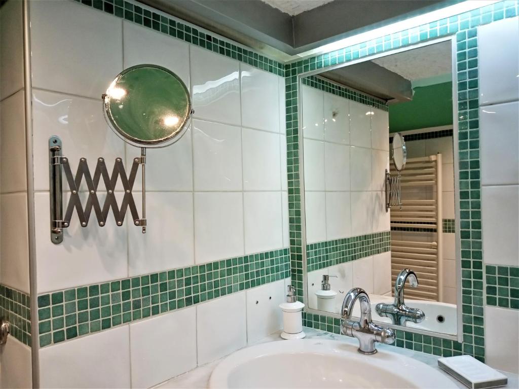 A bathroom at Lilioum Apartment