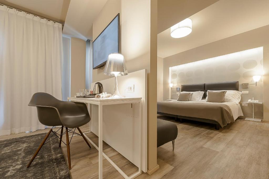 Postel nebo postele na pokoji v ubytování Hotel Monte Meraviglia