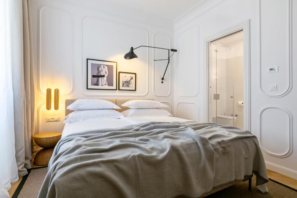 Postel nebo postele na pokoji v ubytování Heritage Hotel FERMAI MGallery Split