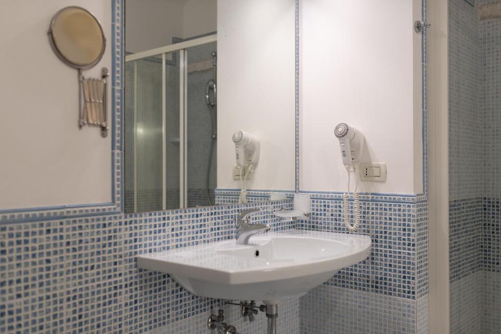 Koupelna v ubytování Hotel La Terra