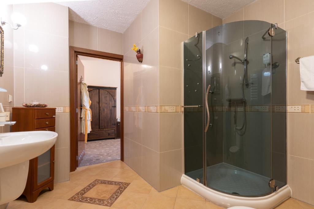Koupelna v ubytování Hotel Trylogia