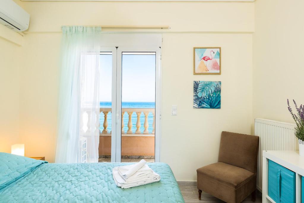 Postel nebo postele na pokoji v ubytování Birais Beach Studios