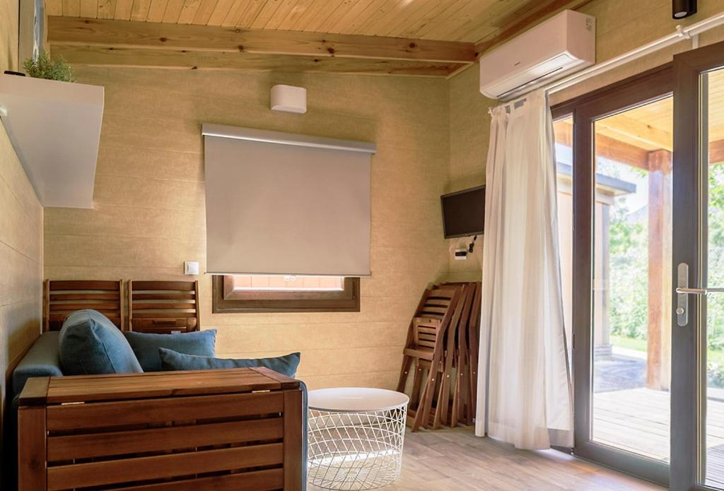 TV a/nebo společenská místnost v ubytování El Arrebol Comfort Camp