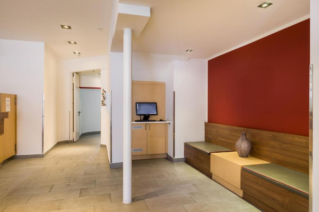TV a/nebo společenská místnost v ubytování Sure Hotel by Best Western Muenchen Hauptbahnhof