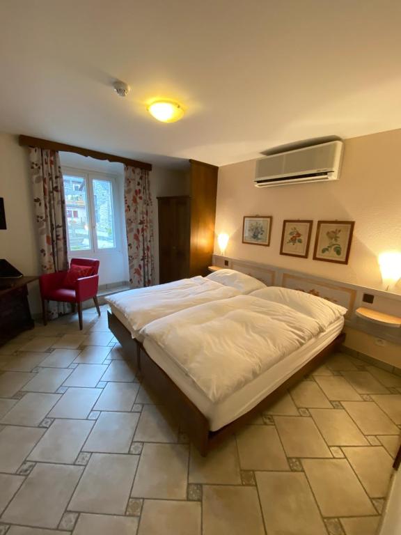 Postel nebo postele na pokoji v ubytování Hotel Antico