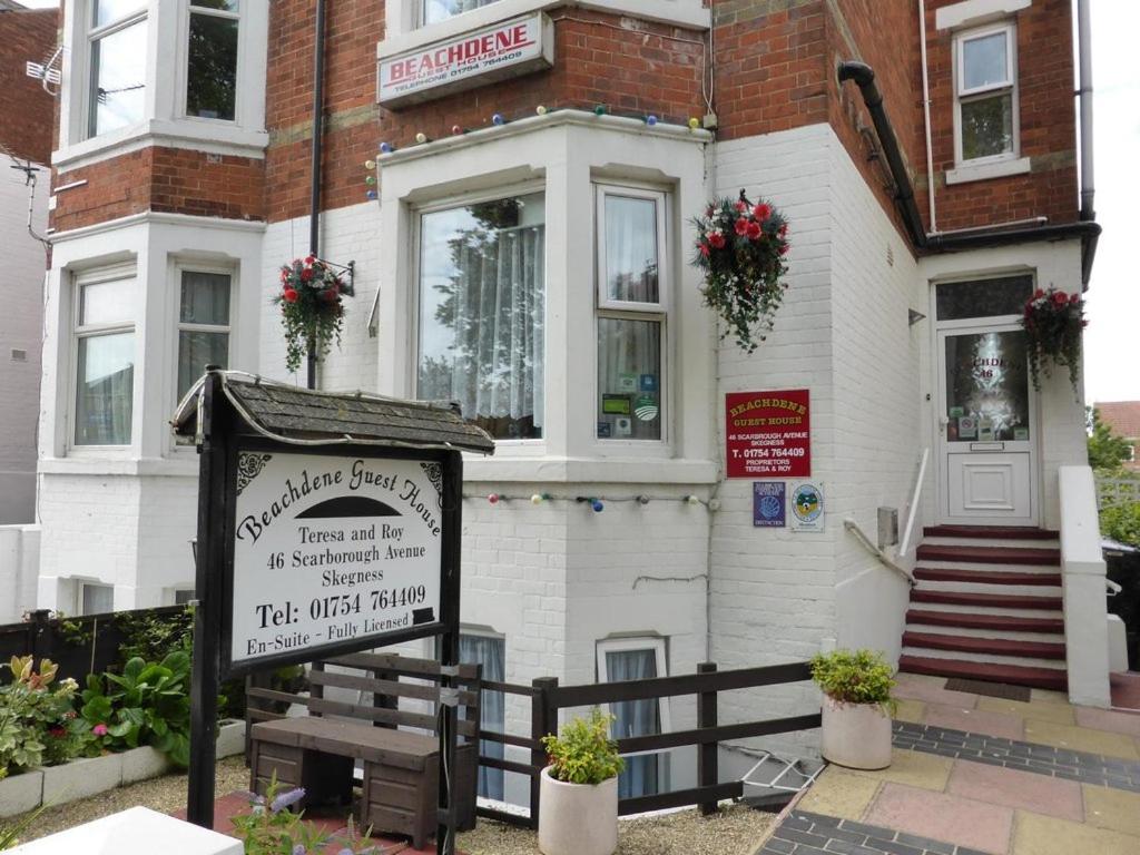 a building with a sign in front of it at Beachdene Guest House in Skegness