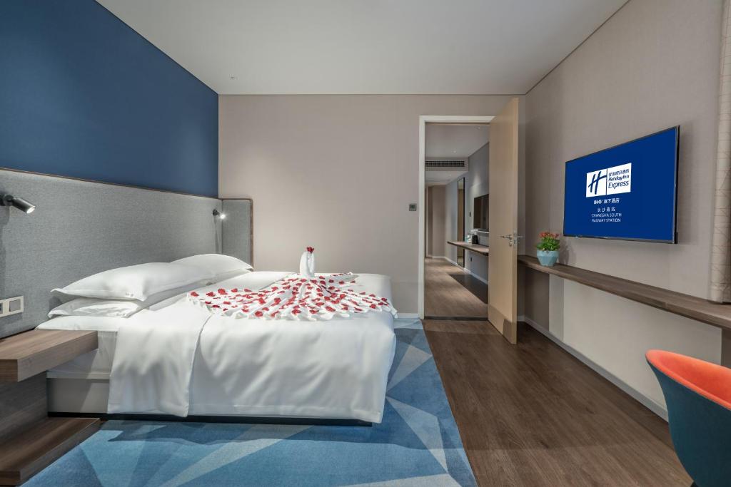 Holiday Inn Express Changsha South Railway Station by IHGにあるベッド